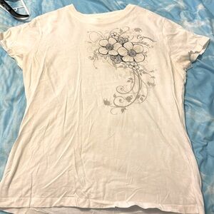 Like new, white t-shirt with flower design